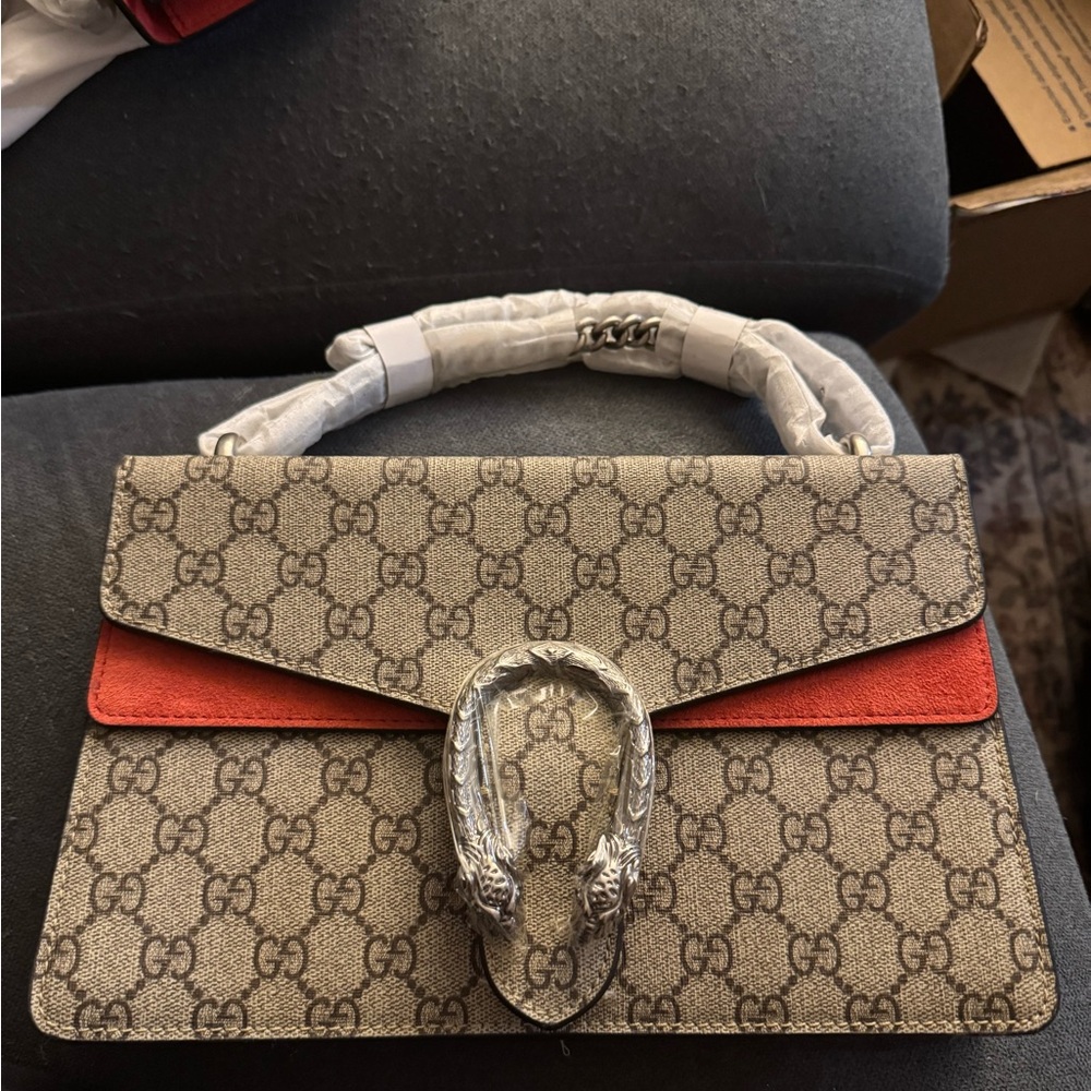 Elegant Monogram Inspired Top Handle Bag with Statement Clasp